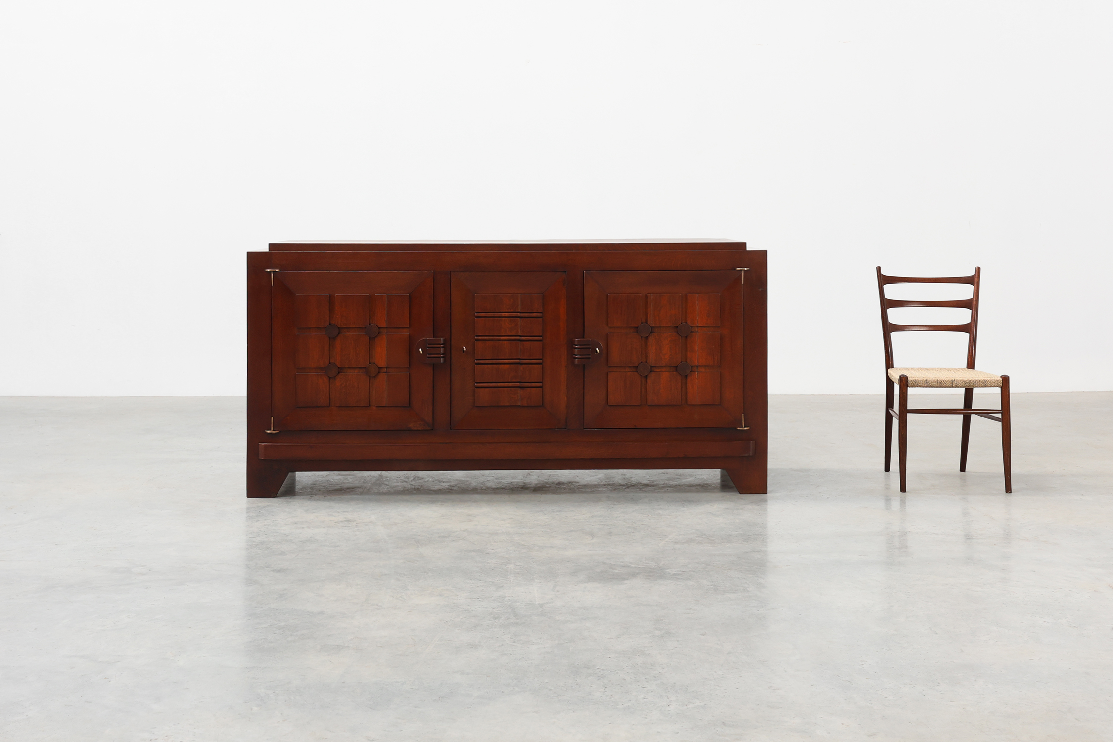 Art Deco carved geometric sideboard by Charles Dudouyt in oak, France ca. 1940thumbnail